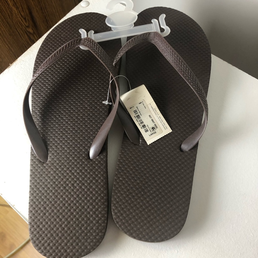 Brand new size 10-11 brown flip flops